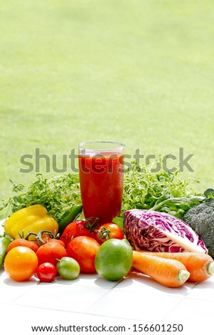 Shot with outdoor tables along with the material the tomato juice