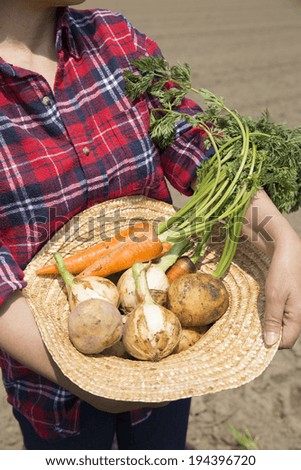 Add to straw hat vegetables harvested