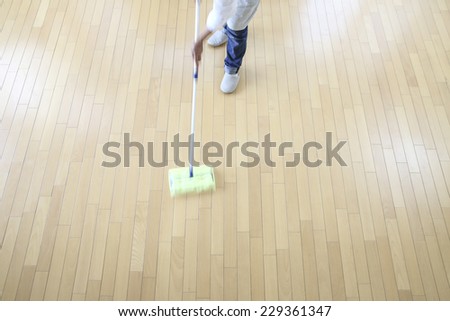 Overhead image of women that have a floor cleaning