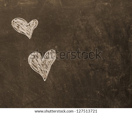 Hearts drawn on blackboard.sepia effect