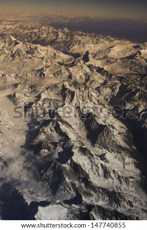 aerial view of italian Alps with clouds and snow.you can see the Mount Cervino