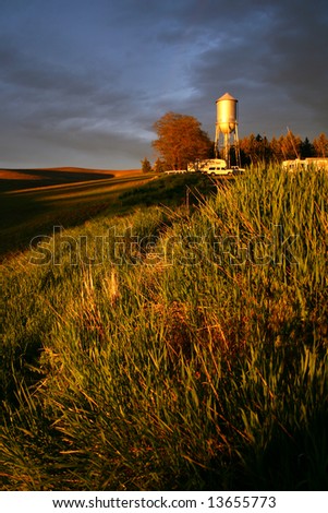 magic sunset light on a water tower