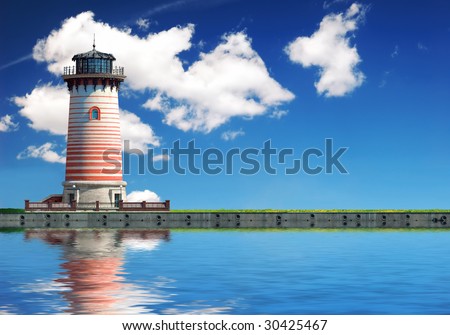 Stone lighthouse on the coastline over blue sky