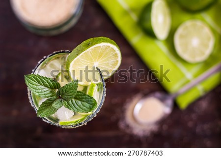 Mojito Lime Alcoholic Drink Cocktail on Wooden Table Overhead
