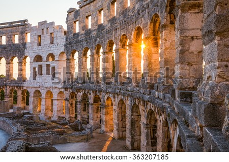 Architecture Details of the Roman Amphitheater Arena in Sunny Summer Evening. Famous Travel Destination in Pula, Croatia.