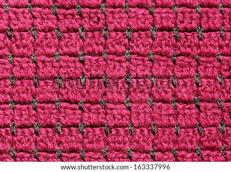Red and black crochet fabric for background