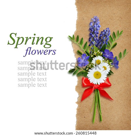 Wild flowers bouquet on white and craft background