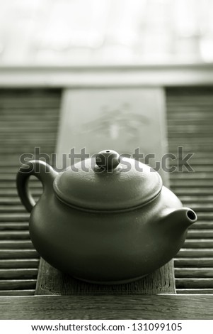 china violet arenaceous kettle, closeup of photo