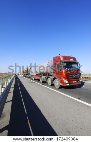 TIANJIN - DECEMBER 9: The heavy duty trucks were stopped on the highway Because of the traffic jam, on December 9, 2013, tianjin, China.