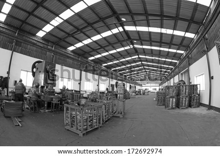 TANGSHAN - DECEMBER 20: Blanking workshop production line, in a manufacturing enterprise, on December 20, 2013, tangshan city, hebei province, China.