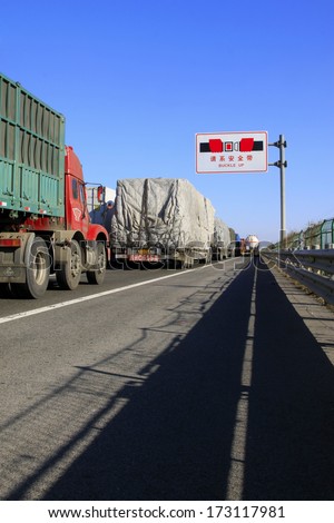 TIANJIN - DECEMBER 9: heavy duty trucks stopped on the highway Because of the traffic jam, on December 9, 2013, tianjin, China.