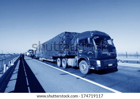 Tianjin - December 9: Heavy Duty Trucks Stopped On The Highway Because Of The Traffic Jam, On December 9, 2013, Tianjin, China.