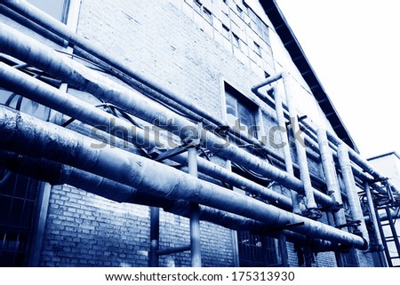 material pipe wrapped in thermal insulation in a factory