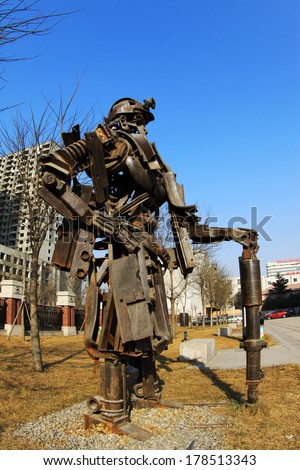 TANGSHAN - JANUARY 2: Miners image metal sculpture, in the Kailuan national mine park, on January 2, 2014, tangshan city, hebei province, China.