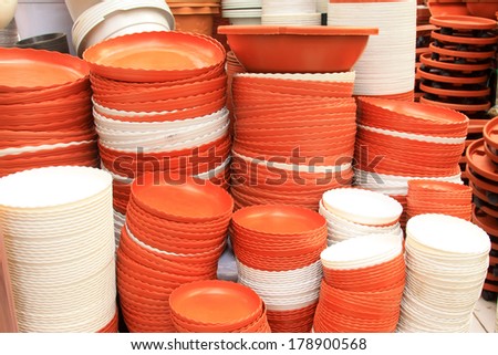 plastic flower pots base in a market, closeup of photo
