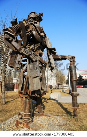 TANGSHAN - JANUARY 2: Miners image metal sculpture, in the Kailuan national mine park, on January 2, 2014, tangshan city, hebei province, China.