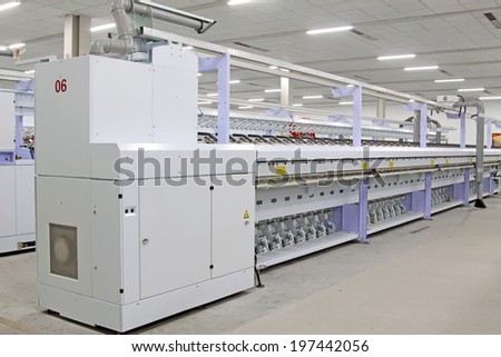 LUANNAN, CHINA - MAY 4: Modern machinery and equipment in a yarn factory, on May 4, 2014, Luannan county, hebei province, China.