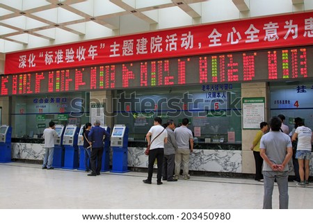 BEIJING - MAY 21: The Chinese people\'s liberation army general hospital outpatient service hall, on may 21, 2014, Beijing, China