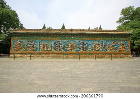 BEIJING - MAY 23: Nine-Dragon Wall (Jiulongbi) at Beihai park, on may 23, 2014, Beijing, China