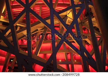 BEIJING - MAY 24: Beijing national stadium - the bird\'s nest local features at night, in the Beijing Olympic park, on may 24, 2014, Beijing, China