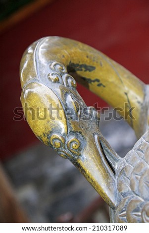 BEIJING - MAY 23: red-crowned crane bronze sculpture in the Beihai Park, on may 23, 2014, Beijing, China
