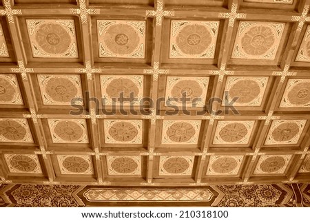 Chinese traditional style ceiling in a temple, closeup of photo