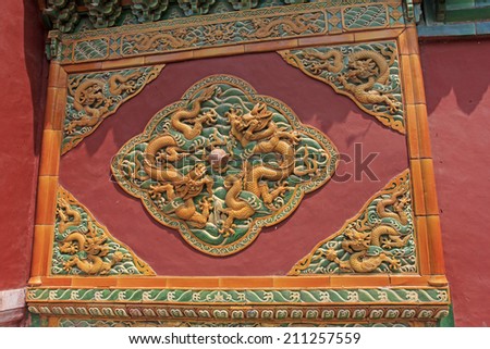 BEIJING - MAY 23: traditional Chinese architectural style glazed carve patterns in the Beihai Park, on may 23, 2014, Beijing, China