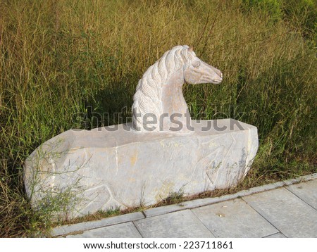 FENGNING COUNTY - AUGUST 20: male horse sculpture in a park, on august 20, 2014, Fengning County, Hebei Province, China
