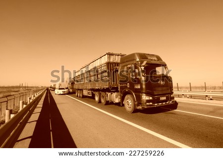 TIANJIN - DECEMBER 9: heavy duty trucks  stopped on the highway Because of the traffic jam, on December 9, 2013, tianjin, China.