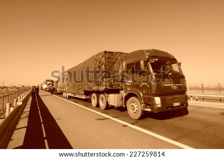 TIANJIN - DECEMBER 9: heavy duty trucks  stopped on the highway Because of the traffic jam, on December 9, 2013, tianjin, China.