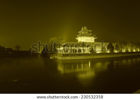 BEIJING - DECEMBER 22: The night view of northeast turrets of the Forbidden City on december 22, 2013, beijing, china.