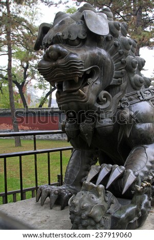 CHENGDE CITY -  OCTOBER 20: Bronze lion sculpture in chengde mountain resort, on october 20, 2014, Chengde City, Hebei Province, China