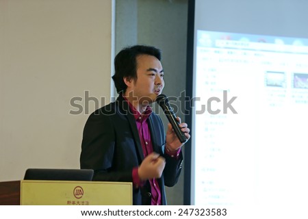 TANGSHAN CITY - DECEMBER 28: Beijing Verde, film and television equipment co., LTD., general manager Yang Tianxiao in the lecture, on December 28, 2014, Tangshan City, Hebei Province, China