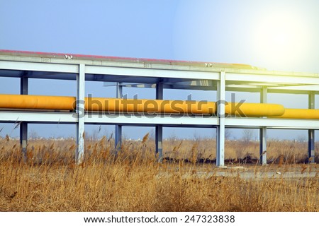 crude oil transmission equipment in a oilfield, closeup of photo