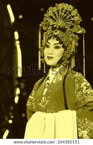 LUANNAN COUNTY - JANUARY 7: The female role in Chinese opera on the stage, in the ChengZhaoCai grand theater, January 7, 2014,luannan county, hebei province, china.