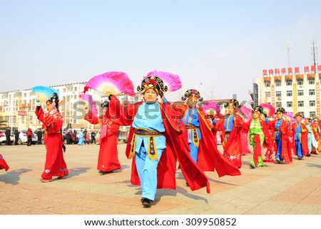 LUANNAN COUNTY - FEBRUARY 26: traditional Chinese style yangko dance performances in the square, on February 26, 2015, Luannan County, Hebei province, China