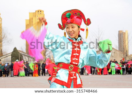 LUANNAN COUNTY - FEBRUARY 27: traditional Chinese style yangko dance performances in the square, on February 27, 2015, Luannan County, Hebei province, China