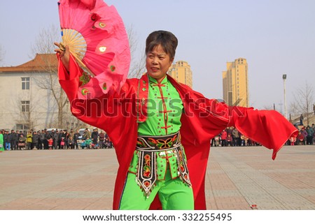 LUANNAN COUNTY - MARCH 6: traditional Chinese style yangko dance performances in the square, on march 6, 2015, Luannan County, Hebei province, China