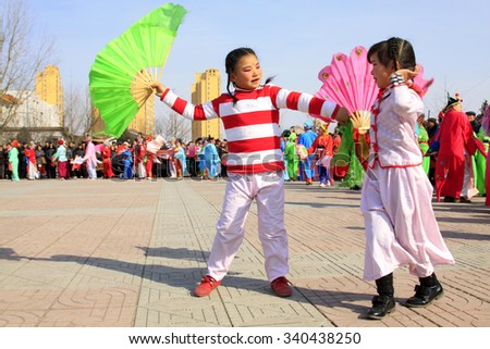 LUANNAN COUNTY - MARCH 5: traditional Chinese style yangko dance performances in the square, on march 5, 2015, Luannan County, Hebei province, China