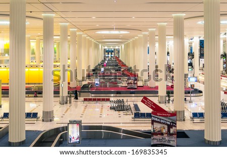 Dubai - January 5, 2014: Wide View Of The Huge Baggage Claim At Terminal 3 In Dubai International Airport. The Terminal Was Opened On 14 October 2008 And Is Currently Worlds Largest Airport Terminal.