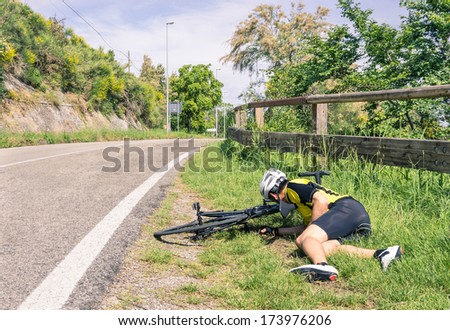 Bicycle accident on the road - Biker in troubles