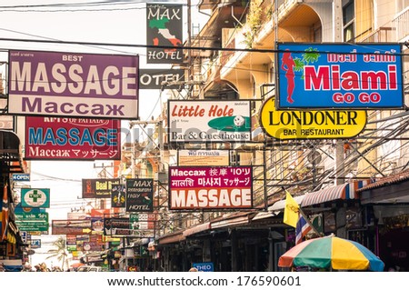Pattaya, Thailand - January 19, 2014: Massage And Other Multicolored Signs On Soi 13/2, A Parallel Street Of Beach Road. The Average Price For One Hour Of Oil Massage Is 300 Baht, Around 10 Dollars.