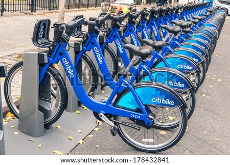 NEW YORK CITY - NOVEMBER 21, 2013: New blue CitiBikes lined up at the exit of Grand Central Terminal in Manhattan downtown. Citi Bike is the largest bike sharing program in the United States.