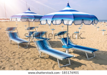 Parasols and sunbeds at Rimini Beach - Italian Summer