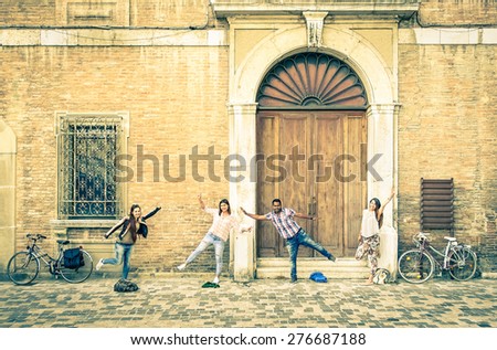 Young hipster best friends having fun posing in classic renaissance area - Youth concept and friendship with people alternative lifestyle - Guys and girls together in the city - Vintage filtered look