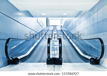 Special Escalator In Modern Mall For People With Supermarket Carts And Disabled People