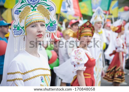 TATARSK, RUSSIA: JUNE 27, 2013 - The Culture Olympics competition of Novosibirsk region. Women in russian national uniform.