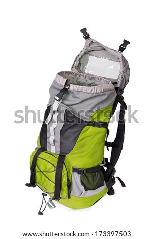 Side shot of green opened touristic backpack on white background