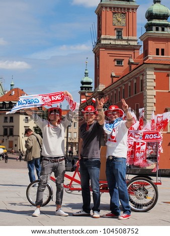 EURO 2012 FOOTBALL SUPPORTERS IN WARSAW, POLAND - JUNE 7: Polish supporters in Warsaw on June 7, 2012. Warsaw will host the opening match of the UEFA Euro 2012.
