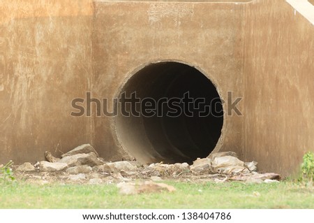 Waste pipe or drainage polluting environment, concrete pipe.